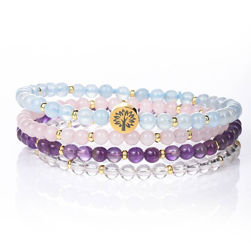 The Serene Sea and the Clear Light: Aquamarine, Rose Quartz, Amethyst, and White Quartz Four-level Serene Energy Spiral Ring