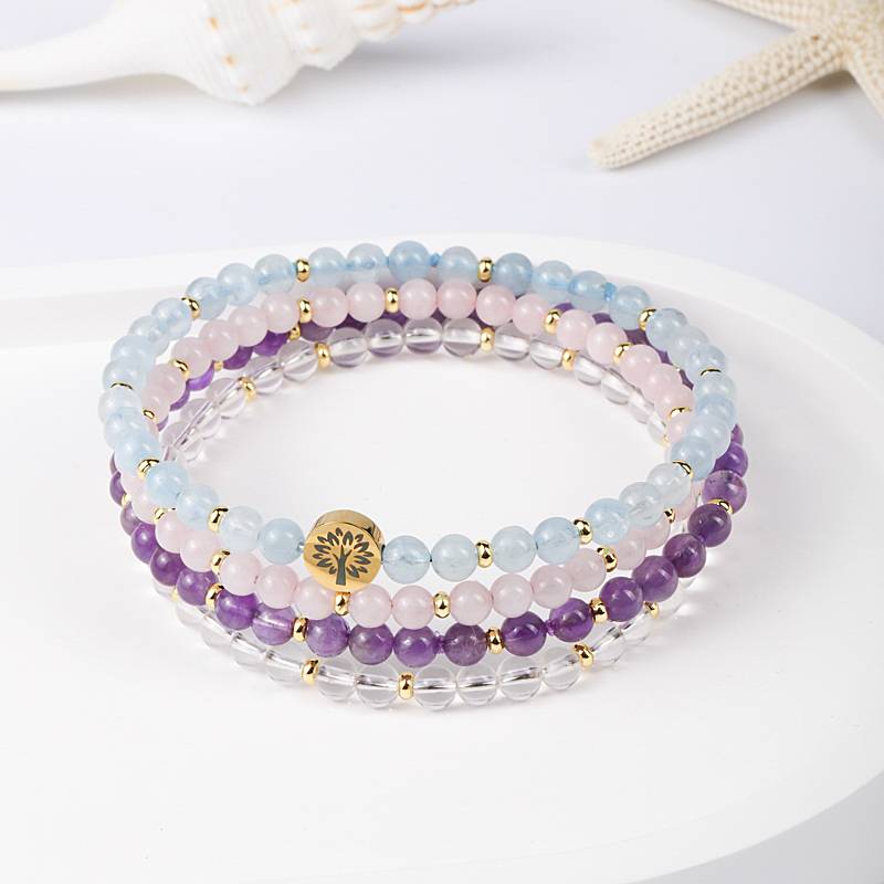 The Serene Sea and the Clear Light: Aquamarine, Rose Quartz, Amethyst, and White Quartz Four-level Serene Energy Spiral Ring