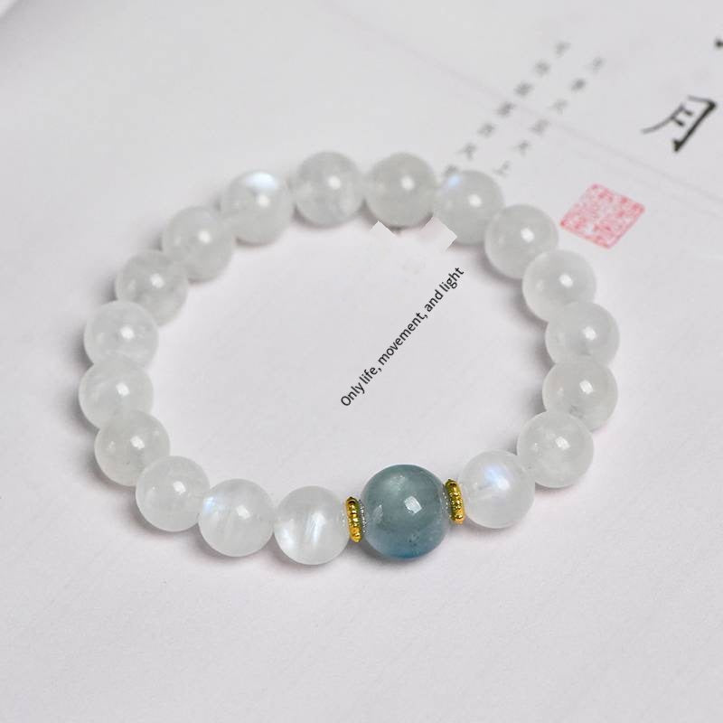 "The moon rises from the sea" design bracelet: Moonstone star River Chain · aquamarine Moon bead