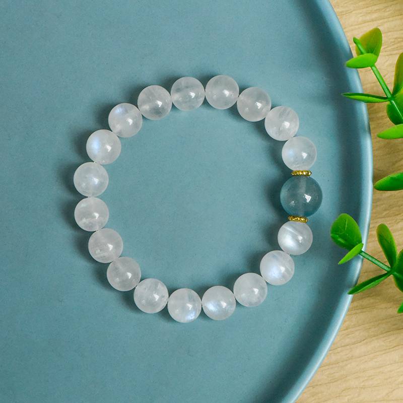 "The moon rises from the sea" design bracelet: Moonstone star River Chain · aquamarine Moon bead