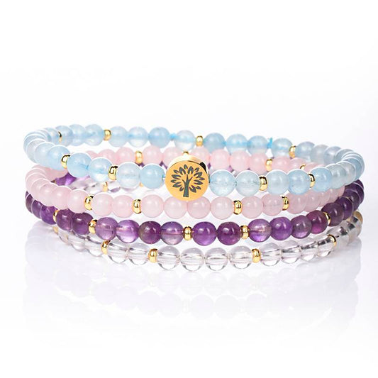 The Serene Sea and the Clear Light: Aquamarine, Rose Quartz, Amethyst, and White Quartz Four-level Serene Energy Spiral Ring