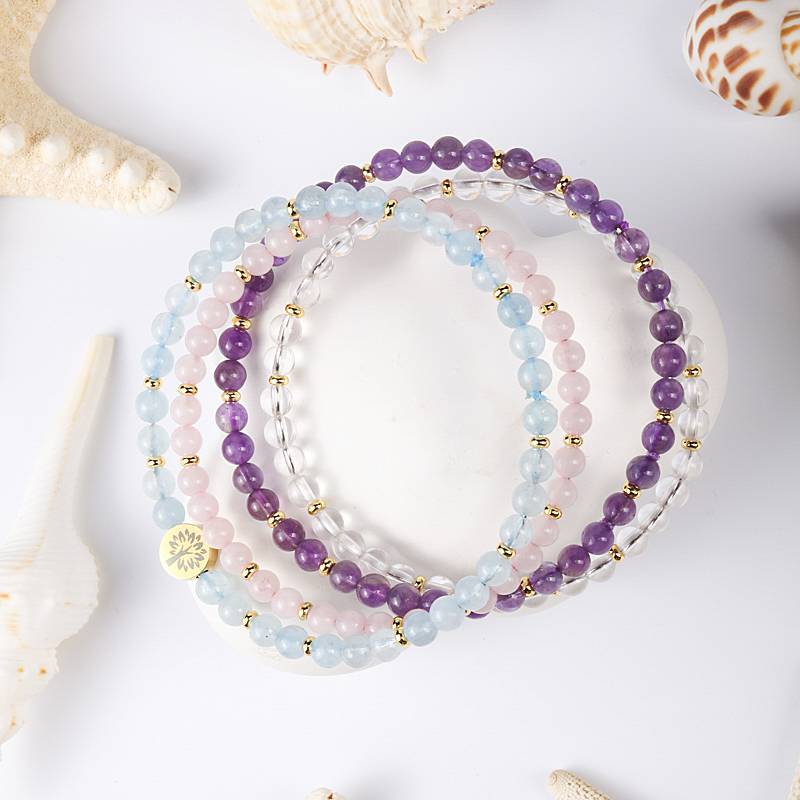 The Serene Sea and the Clear Light: Aquamarine, Rose Quartz, Amethyst, and White Quartz Four-level Serene Energy Spiral Ring