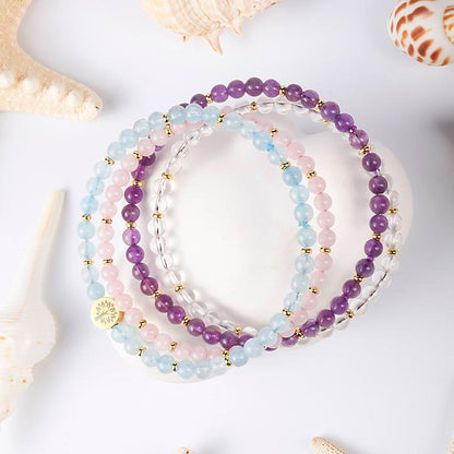 The Serene Sea and the Clear Light: Aquamarine, Rose Quartz, Amethyst, and White Quartz Four-level Serene Energy Spiral Ring